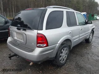 2006 Buick Rainier CXL with VIN 5GADT13S762142937, listed as a IAAI auction lot 41228865 with 275,920 mi miles. Bid and sale history available at carsss.com. Image 4.