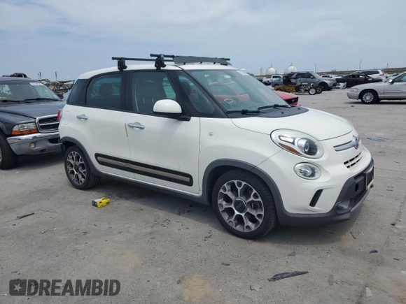 2014 FIAT 500L Trekking with VIN ZFBCFADH0EZ010311, listed as a Copart auction lot 62334095 with 139,917 mi miles and Salvage title. Bid and sale history available at DreamBid. Image 4.