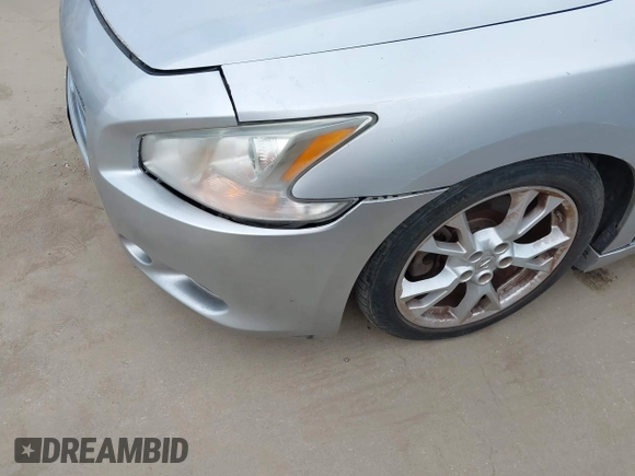 2014 Nissan Maxima SV with VIN 1N4AA5APXEC451832, listed as a IAAI auction lot 42749050 with 137,524 mi miles and . Bid and sale history available at DreamBid. Image 6.