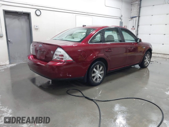 2008 Ford Taurus SEL with VIN 1FAHP27W38G172116, listed as a IAAI auction lot 41824616 with 176,864 mi miles. Bid and sale history available at carsss.com. Image 4.