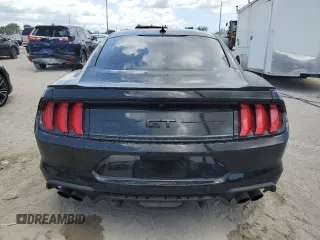 2021 Ford Mustang GT with VIN 1FA6P8CFXM5147543, listed as a Copart auction lot 61765065 with 36,825 mi miles and Salvage title. Bid and sale history available at DreamBid. Image 6.