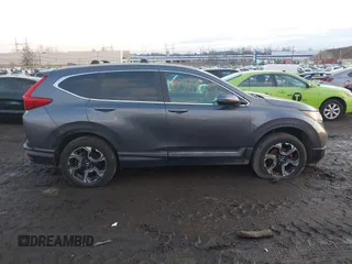 2017 Honda CR-V Touring with VIN 2HKRW2H94HH617081, listed as a IAAI auction lot 41294254 with 145,140 mi miles. Bid and sale history available at carsss.com. Image 13.