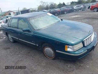 1999 Cadillac DeVille DHS z VIN 1G6KE54Y9XU766791, wystawiony jako IAAI lot #42005553 z przebiegiem 140 515 mil mil oraz . Historia ofert i sprzedaży dostępna na DreamBid. Obrazek 1.
