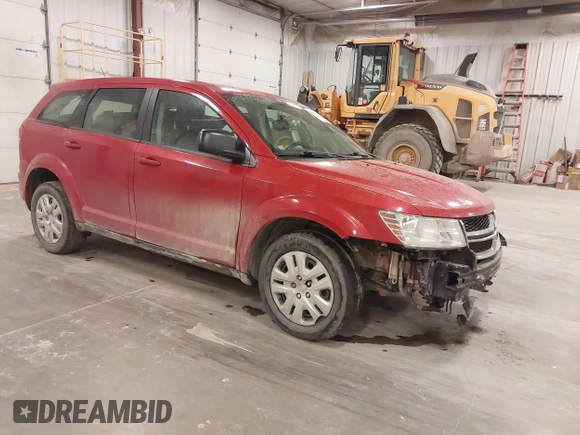 2015 Dodge Journey American Value z VIN 3C4PDCAB5FT720300, wystawiony jako IAAI lot #42074690 z przebiegiem 144 690 mil mil oraz . Historia ofert i sprzedaży dostępna na DreamBid. Obrazek 1.