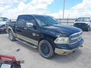 2014 Ram 1500 Longhorn with VIN 1C6RR6PT8ES229576, listed as a IAAI auction lot 42615286 with 132,424 mi miles and . Bid and sale history available at DreamBid. Image 1.