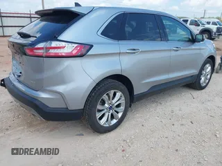 2022 Ford Edge Titanium with VIN 2FMPK4K99NBB06136, listed as a IAAI auction lot 42733977 with 57,794 mi miles and . Bid and sale history available at DreamBid. Image 4.
