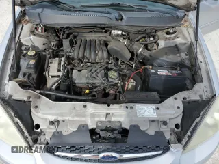 2003 Ford Taurus LX Standard z VIN 1FAFP52U43A110444, wystawiony jako Copart lot #83557764 z przebiegiem 118 897 mil mil oraz Szkoda całkowita • Salvage title. Historia ofert i sprzedaży dostępna na DreamBid. Obrazek 11.