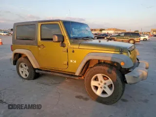 2008 Jeep Wrangler X with VIN 1J4FA24148L617265, listed as a Copart auction lot 53054495 with 143,270 mi miles and Salvage Title. Bid and sale history available at DreamBid. Image 4.