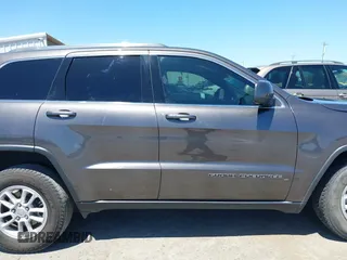 2020 Jeep Grand Cherokee Altitude with VIN 1C4RJEAG8LC373481, listed as a IAAI auction lot 42495686 with 73,716 mi miles and . Bid and sale history available at DreamBid. Image 13.