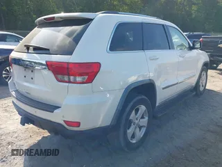 2011 Jeep Grand Cherokee Laredo with VIN 1J4RS4GGXBC517068, listed as a IAAI auction lot 42173780 with 170,688 mi miles and . Bid and sale history available at DreamBid. Image 4.