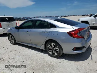 2017 Honda Civic EX-L with VIN 19XFC1F7XHE030606, listed as a Copart auction lot 56536095 with 101,465 mi miles and Salvage title. Bid and sale history available at DreamBid. Image 2.