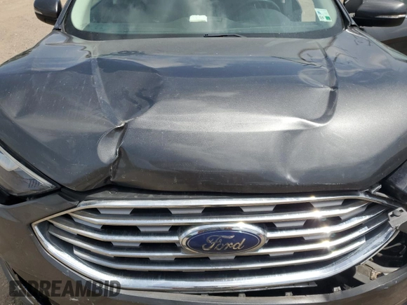 2020 Ford Edge SEL с VIN 2FMPK3J92LBA30123, выставлен на аукционе Copart как лот 63192805 с пробегом 119 534 миль миль и Списание • Salvage title. История ставок и продаж доступна на DreamBid. Изображение 11.