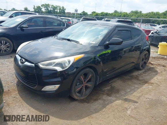 2013 Hyundai Veloster w/Black Int с VIN KMHTC6ADXDU084704, выставлен на аукционе IAAI как лот 42443297 с пробегом 111 587 миль миль и . История ставок и продаж доступна на DreamBid. Изображение 2.