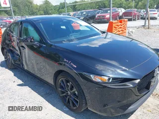 2024 Mazda 3 S Select Sport with VIN JM1BPAKM1R1704032, listed as a IAAI auction lot 42871113 with 31,861 mi miles and . Bid and sale history available at DreamBid. Image 1.