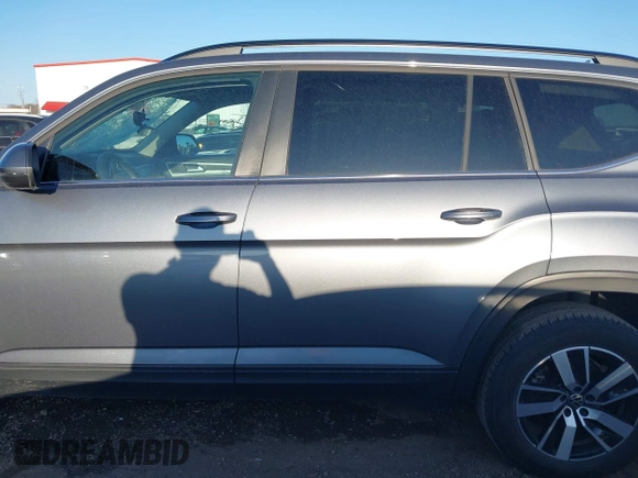 2022 Volkswagen Atlas SE with VIN 1V2DP2CA9NC533465, listed as a IAAI auction lot 41108974 with 74,684 mi miles and . Bid and sale history available at DreamBid. Image 13.