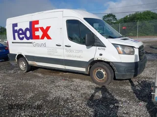 2020 Ford Transit Cargo z VIN 1FTBR1C87LKA51039, wystawiony jako IAAI lot #42212523 z przebiegiem 183 020 mil mil oraz . Historia ofert i sprzedaży dostępna na DreamBid. Obrazek 1.