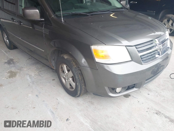 2010 Dodge Grand Caravan SXT z VIN 2D4RN5D11AR220105, wystawiony jako IAAI lot #42299610 z przebiegiem 223 842 mil mil oraz . Historia ofert i sprzedaży dostępna na DreamBid. Obrazek 6.