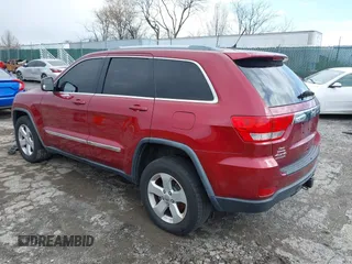 2012 Jeep Grand Cherokee Laredo with VIN 1C4RJFAG7CC221682, listed as a IAAI auction lot 41881922 with 218,762 mi miles. Bid and sale history available at carsss.com. Image 3.