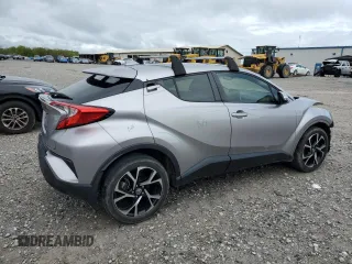 2019 Toyota C-HR XLE with VIN JTNKHMBX7K1048428, listed as a Copart auction lot 51943135 with 82,957 mi miles and Salvage Title. Bid and sale history available at carsss.com. Image 3.