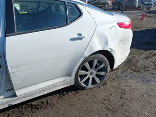 2012 Kia Optima SX with VIN 5XXGR4A67CG013295, listed as a IAAI auction lot 41678031 with 186,253 mi miles and . Bid and sale history available at carsss.com. Image 6.