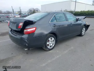 2009 Toyota Camry LE with VIN 4T1BK46K29U588245, listed as a IAAI auction lot 41463767 with 110,376 mi miles. Bid and sale history available at carsss.com. Image 4.