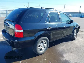 2002 Acura MDX Touring Pkg with VIN 2HNYD18612H538902, listed as a IAAI auction lot 41676747 with 202,715 mi miles. Bid and sale history available at carsss.com. Image 4.