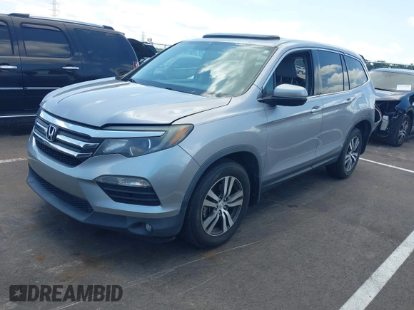 2018 Honda Pilot EX-L with VIN 5FNYF5H56JB003955, listed as a IAAI auction lot 42732433 with 116,613 mi miles and . Bid and sale history available at DreamBid. Image 2.