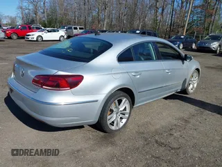 2013 Volkswagen CC Lux z VIN WVWRN7AN2DE506840, wystawiony jako IAAI lot #41843448 z przebiegiem 152 344 mil mil oraz . Historia ofert i sprzedaży dostępna na DreamBid. Obrazek 4.