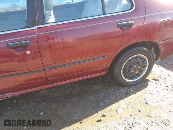 1996 Nissan Sentra XE z VIN 1N4AB41D7TC770549, wystawiony jako IAAI lot #41160561 z przebiegiem 180 485 mil mil oraz . Historia ofert i sprzedaży dostępna na DreamBid. Obrazek 17.