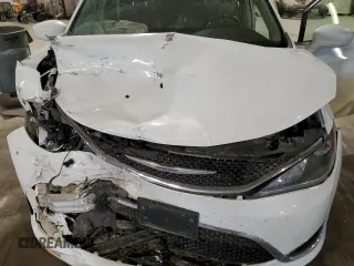 2020 Chrysler Pacifica Touring with VIN 2C4RC1FG7LR267106, listed as a Copart auction lot 58535025 with 137,330 mi miles and Salvage title. Bid and sale history available at DreamBid. Image 12.