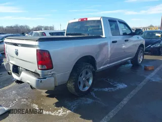 2014 Ram 1500 Tradesman with VIN 1C6RR6FT2ES170512, listed as a IAAI auction lot 41328812 with 217,416 mi miles and . Bid and sale history available at DreamBid. Image 4.