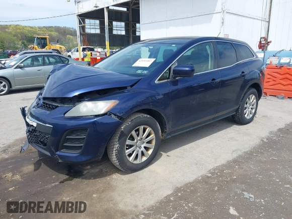 2011 Mazda CX-7 i Sport with VIN JM3ER2BM2B0402765, listed as a IAAI auction lot 42095402 with 206,502 mi miles and . Bid and sale history available at carsss.com. Image 2.