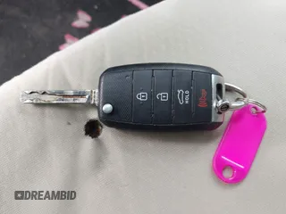2014 Kia Optima LX z VIN KNAGM4A77E5453187, wystawiony jako IAAI lot #42357588 z przebiegiem 162 501 mil mil oraz . Historia ofert i sprzedaży dostępna na DreamBid. Obrazek 11.