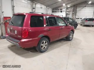 2004 Honda Pilot EX with VIN 2HKYF18584H588973, listed as a IAAI auction lot 41800129 with 221,498 mi miles. Bid and sale history available at carsss.com. Image 4.