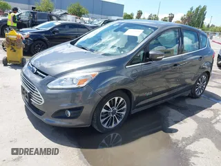 2017 Ford C-Max Titanium z VIN 1FADP5FU9HL103731, wystawiony jako IAAI lot #42244091 z przebiegiem 50 292 mil mil oraz . Historia ofert i sprzedaży dostępna na DreamBid. Obrazek 2.