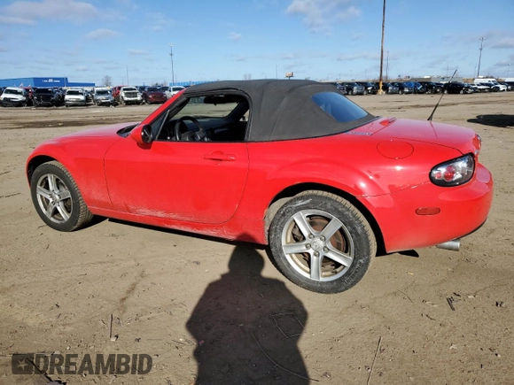 2006 Mazda MX-5 Miata Touring z VIN JM1NC25F360110572, wystawiony jako Copart lot #50555765 z przebiegiem 166 785 mil mil oraz Czysty tytuł • Clean title. Historia ofert i sprzedaży dostępna na DreamBid. Obrazek 2.
