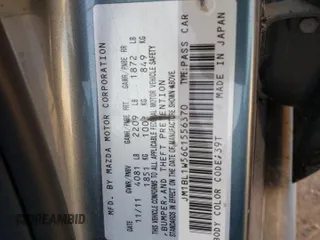 2012 Mazda 3 S Grand Touring with VIN JM1BL1W56C1556370, listed as a Copart auction lot 65217784 with Not Provided miles and Salvage Title. Bid and sale history available at DreamBid. Image 12.