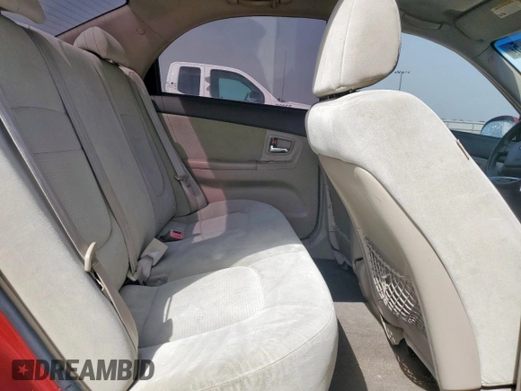 2007 Kia Spectra EX with VIN KNAFE122475378574, listed as a Copart auction lot 56921925 with 142,268 mi miles and Salvage title. Bid and sale history available at DreamBid. Image 10.