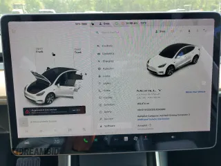 2020 Tesla Model Y Long Range z VIN 5YJYGDEEXLF043910, wystawiony jako Copart lot #54007745 z przebiegiem 102 974 mil mil oraz Szkoda całkowita • Salvage title. Historia ofert i sprzedaży dostępna na DreamBid. Obrazek 9.