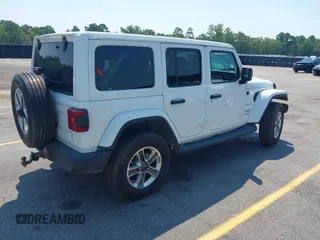 2018 Jeep Wrangler Unlimited Sahara with VIN 1C4HJXEG6JW112976, listed as a IAAI auction lot 42559123 with 76,066 mi miles and . Bid and sale history available at DreamBid. Image 4.