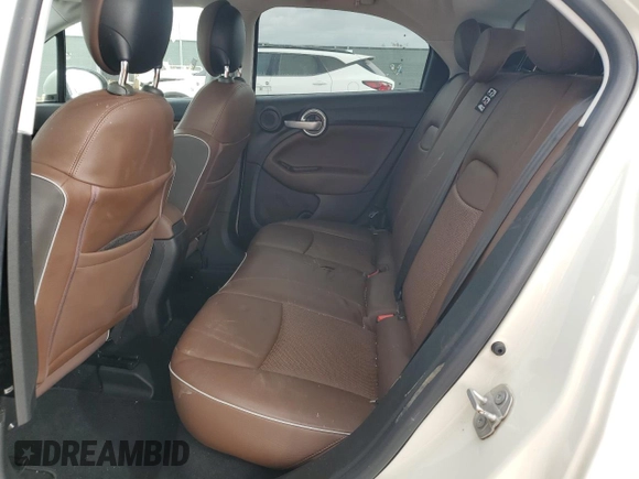 2017 FIAT 500X Lounge z VIN ZFBCFXDB6HP622947, wystawiony jako Copart lot #44979985 z przebiegiem 57 373 mil mil oraz Szkoda całkowita • Salvage title. Historia ofert i sprzedaży dostępna na DreamBid. Obrazek 10.