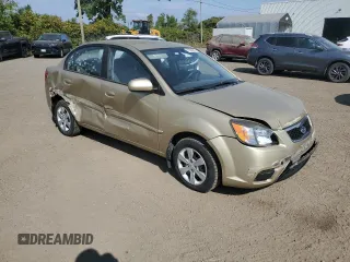 2011 Kia Rio with VIN KNADH4B38B6725531, listed as a Copart auction lot 72389974 with 124,315 mi miles and Salvage Title. Bid and sale history available at DreamBid. Image 4.