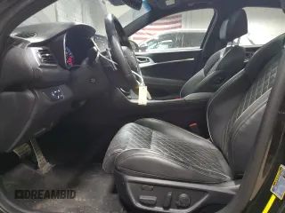 2019 Genesis G70 Advanced with VIN KMTG34LE9KU025478, listed as a Copart auction lot 49776525 with 57,583 mi miles and Salvage title. Bid and sale history available at DreamBid. Image 7.