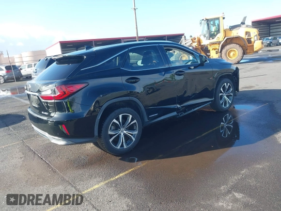 2016 Lexus RX 450h with VIN 2T2BGMCA9GC002373, listed as a IAAI auction lot 41473741 with 85,493 mi miles and . Bid and sale history available at DreamBid. Image 4.