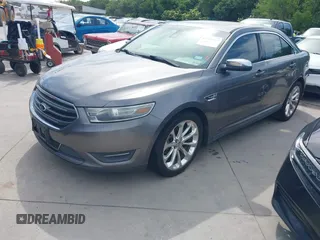 2014 Ford Taurus Limited z VIN 1FAHP2F82EG127439, wystawiony jako IAAI lot #42320119 z przebiegiem 191 876 mil mil oraz . Historia ofert i sprzedaży dostępna na DreamBid. Obrazek 2.
