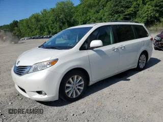 2011 Toyota Sienna XLE AAS with VIN 5TDYK3DCXBS013499, listed as a Copart auction lot 60101675 with 176,218 mi miles and Salvage title. Bid and sale history available at DreamBid. Image 1.