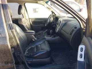 2005 Ford Escape Limited with VIN 1FMCU94115KB85496, listed as a IAAI auction lot 41384428 with 158,852 mi miles and . Bid and sale history available at DreamBid. Image 5.
