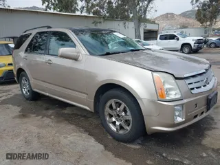 2006 Cadillac SRX with VIN 1GYEE637660132539, listed as a IAAI auction lot 41880350 with 128,177 mi miles. Bid and sale history available at carsss.com. Image 1.