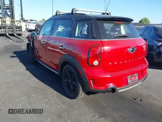 2016 MINI Countryman S with VIN WMWZC5C50GWU02754, listed as a IAAI auction lot 42702055 with 105,284 mi miles and . Bid and sale history available at DreamBid. Image 3.