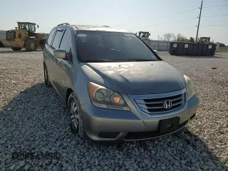 2009 Honda Odyssey EX-L with VIN 5FNRL38799B034292, listed as a Copart auction lot 52547205 with 116,658 mi miles and Salvage Title. Bid and sale history available at DreamBid. Image 11.